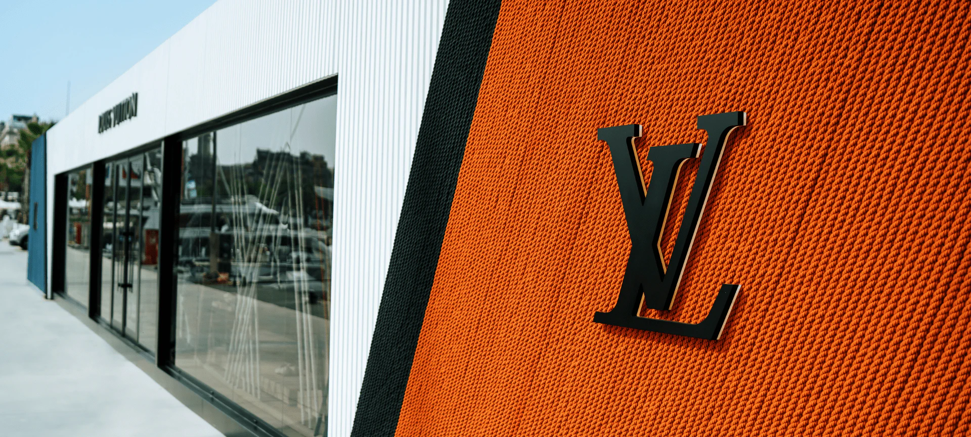 Luxury brand storefront with large black 